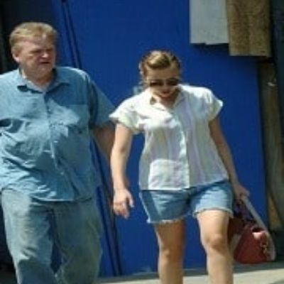 Picture of Karsten and his daughter Scarlett walking on a road